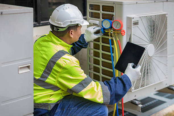Professional Hvac technician working in Essex, IL